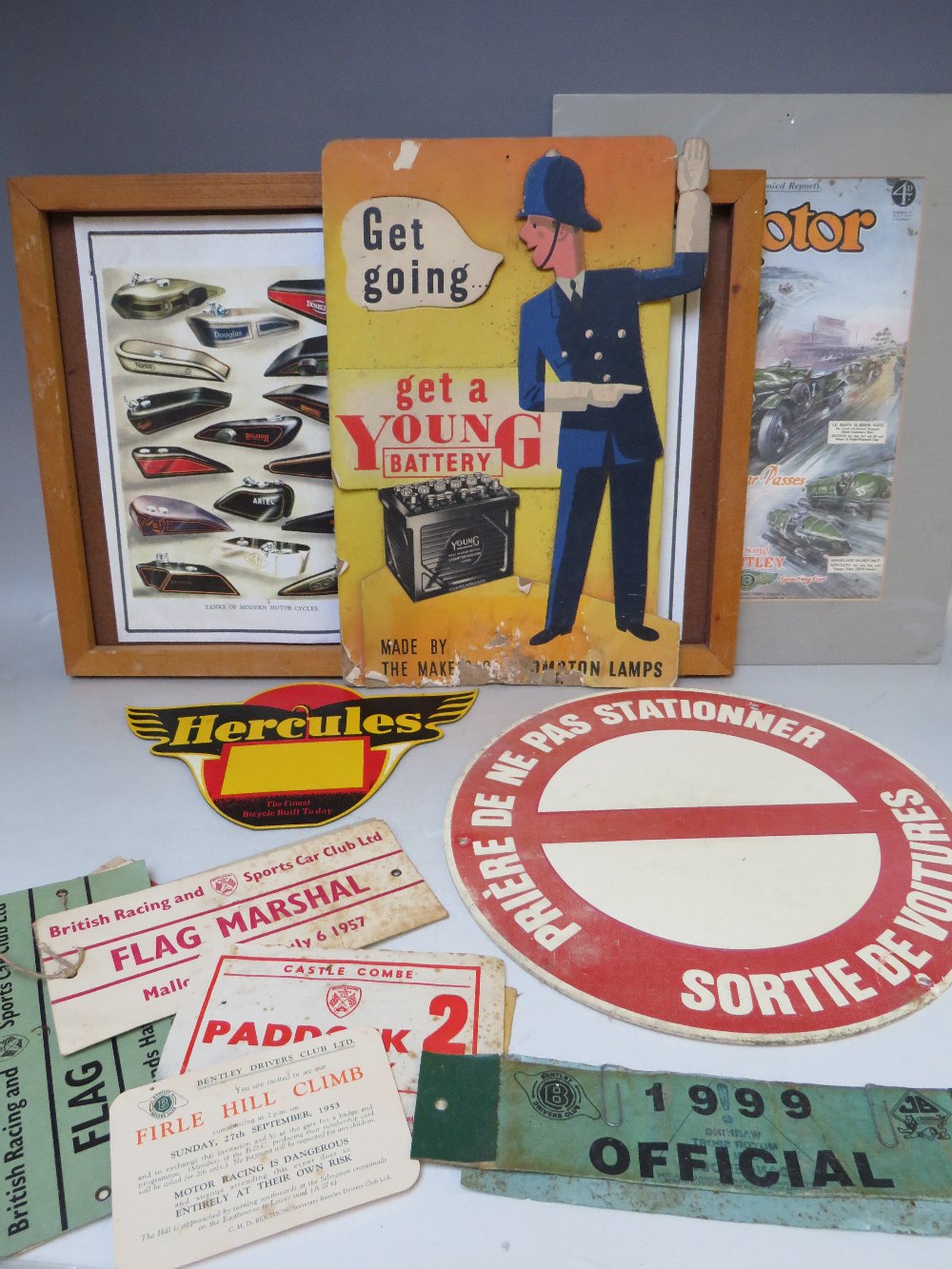 A QUANTITY OF CARDED AUTOMOBILIA, to include a Young point of sale counter display, two wall