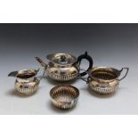 A HALLMARKED SILVER THREE PIECE BACHELOR'S TEA SERVICE BY THE PAIRPOINT BROTHERS - LONDON 1900,