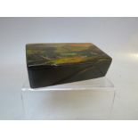 AN ANTIQUE BLACK LACQUER WARE SNUFF BOX, of rectangular form, with typical scenic / landscape