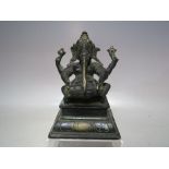 AN ORIENTAL BRONZED METAL DEITY FIGURE OF GANESHA, H 16 cm