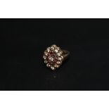 A HALLMARKED 9 CARAT GOLD GARNET CLUSTER RING, approx weight 5.2g, ring size O