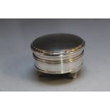 A HALLMARKED SILVER JEWELLERY BOX BY BARKER BROTHERS SILVER LTD - BIRMINGHAM 1931, on three ball and