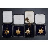 A COLLECTION OF FOUR HALLMARKED 9 CARAT GOLD WESTERN COUNTIES A.S.A STAR MEDALS, awarded for girls