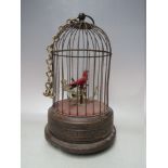 A MID TWENTIETH CENTURY SINGING BIRD CAGE AUTOMATON, for restorationCondition Report:not signed,