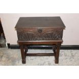 AN ANTIQUE OAK CARVED COFFER ON STAND, W 75 cm, D 46 cm, H 78.5 cm