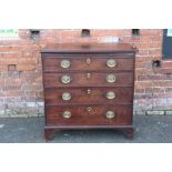 A NINETEENTH CENTURY MAHOGANY SMALL GENTLEMANS CHEST, with brushing slide above two short and