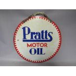 A VINTAGE ENAMELLED DOUBLE SIDED SIGN FOR PRATTS MOTOR OIL, circular with leather mounting strap