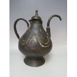 A MOROCCAN STYLE COPPER TEA POT, with half moon decorations, H 28 cm