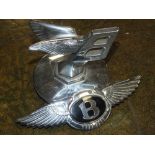 A VINTAGE CHROME BENTLEY 'FLYING B' CAR MASCOT RADIATOR CAP, together with another chrome Bentley