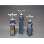 A COLLECTION OF THREE LLADRO NUN FIGURES, comprising 'Prayerful Moment' 5500, hand signed and