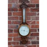 A VICTORIAN CARVED OAK ANEROID BAROMETER BY T WOOLEY - CHESTER, H 87 cm