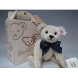 A STEIFF LIMITED EDITION 'A MILLION HUGS' 100TH BIRTHDAY CELEBRATION BEAR 1907 / 2007, wool white