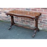 A VICTORIAN ROSEWOOD SHAPED RECTANGULAR OCCASIONAL TABLE, having pierced lattice supports united