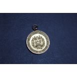 A HALLMARKED 9 CARAT GOLD STAFFORDSHIRE COUNTY WATER POLO AND SWIMMING ASSOCIATION MEDAL BY C
