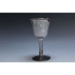A HALLMARKED SILVER CHALICE - BIRMINGHAM 1980, having a planished type finish, makers mark TCN,