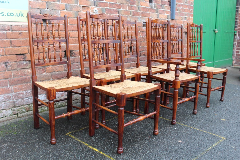 A SET OF EIGHT OAK AND WICKER SEAT CHAIRS, with typical spindle backs (7 + 1) - Image 3 of 5