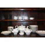 A TRAY OF VINTAGE GERMAN FLORAL CHINA TO INCLUDE A TEAPOT