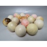 A COLLECTION OF SIXTEEN VICTORIAN IVORY SNOOKER BALLS, approx Dia. 5.7 cm, as found