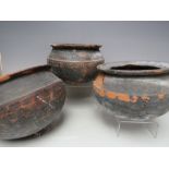 THREE ANTIQUE / ARCHAIC ? MEDITERRANEAN BLACK GLAZED TERRACOTTA / EARTHENWARE VESSELS, largest