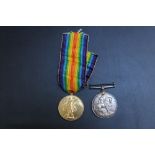 A PAIR OF WWI MEDALS AWARDED TO C-6586 SJT. H S GRIFFEN K.R.RIF.C.