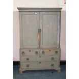 A NINETEENTH CENTURY PAINTED LINEN PRESS, the twin door upper section opening to four linen