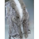A LADIES GREY FUR GILET, approximate size 10 / 12