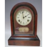 A NINETEENTH CENTURY ROSEWOOD AMERICAN MANTEL CLOCK, the domed case opening from the front, key
