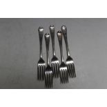 A MATCHED SET OF FIVE HALLMARKED SILVER DESSERT FORKS WITH CREST OF A BIRD PERCHED ON A BUGLE -