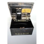 A VINTAGE 'MIGNON' STYLUS INDEX TYPEWRITER WITH ORIGINAL COVER, W 34.5 cm