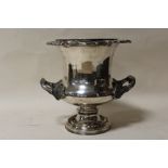 AN ORNATE SILVER PLATED TWIN HANDLED CHAMPAGNE / ICE BUCKET, H 24.5 cm, W 25 cm, Dia. 23 cm
