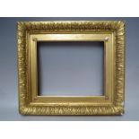 A 19TH CENTURY GOLD FRAME WITH ACANTHUS LEAF DESIGN TO OUTER EDGE, with gold slip, frame W 4.5 cm,