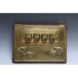 A BRASS MOUNTED WALL HANGING PIPE STAND, embossed with 'Wild oats make a bad Autumn Crop', W 23 cm