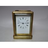 A FINE JULES OF PARIS BELL STRIKE CARRIAGE CLOCK, the brass gorge case having large bevelled glass
