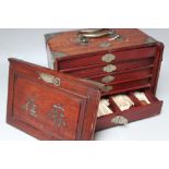 A VINTAGE ORIENTAL MAH JONG SET, contained in a fitted wooden case, contents unchecked, A/F