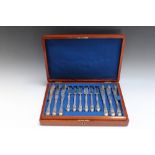 A SET OF TWELVE HALLMARKED SILVER FISH KNIVES AND FORKS BY JOHN GILBERT- BIRMINGHAM 1879, the