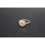A HALLMARKED 9 CARAT GOLD DRESS RING, set with CZ,s, approx weight 2.5g, ring size L