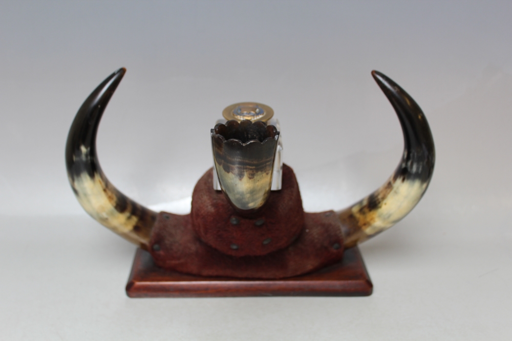 A 19TH CENTURY HORN / HOOF INKSTANDISH, having central glass square inkwell, raised on a mahogany - Image 2 of 3