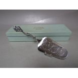 A NORWEGIAN SILVER CAKE SLICE, with reticulated ornate handle and engraved embellishment to 'slice',