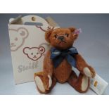 A STEIFF LIMITED EDITION 'A MILLION HUGS' 100TH BIRTHDAY CELEBRATION BEAR 1907 / 2007, red brown