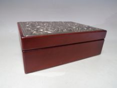 A VINTAGE WOODEN JEWELLERY BOX WITH HALLMARKED SILVER PANEL TO LID, the hinged lid opening to reveal