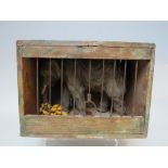 A VICTORIAN MODEL OF A CAGED CIRCUS ELEPHANT, W 17.5 cm, D 12 cm, H 12.5 cm