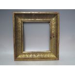 A LATE 18TH / EARLY 19TH GOLD FOILED FRAME, with hinged slip, no key, A/F, frame W 5 cm, slip rebate