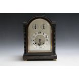 AN EARLY TWENTIETH CENTURY OAK CASED WESTMINSTER CHIME MANTEL CLOCK, silvered dial, the case with