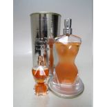 A BOXED JEAN PAUL GAULTIER PERFUME ATOMISER, 50ml natural stray, together with a miniature bottle of