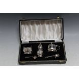 A CASED HALLMARKED SILVER FIVE PIECE CRUET SET BY ADIE BROS - BIRMINGHAM 1960/61, box W 22 cm