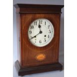 AN EDWARDIAN MAHOGANY INLAID SMALL MANTEL CLOCK, with U.S.A. eight day movement, H 22 cm
