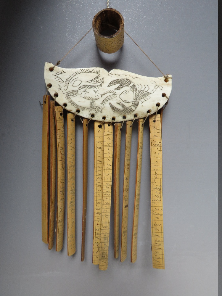 AN UNUSUAL BONE AND BAMBOO WIND CHIME, with scrimshaw type embellishment, W 10.5 cm, H 20