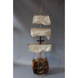 A FINE SCALE CROSS SECTION MODEL OF CAPTAIN JAMES COOK'S SHIP HMS ENDEAVOUR, W 33 cm, H 78 cm