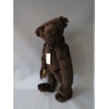 A STEIFF LIMITED EDITION MOHAIR BRITISH COLLECTORS 'REPLICA DARK BROWN TEDDY BEAR, number 2050 of