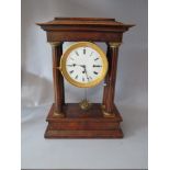 A NINETEENTH CENTURY MAHOGANY PORTICO CLOCK, of classical outline, the pillars with inlaid satinwood